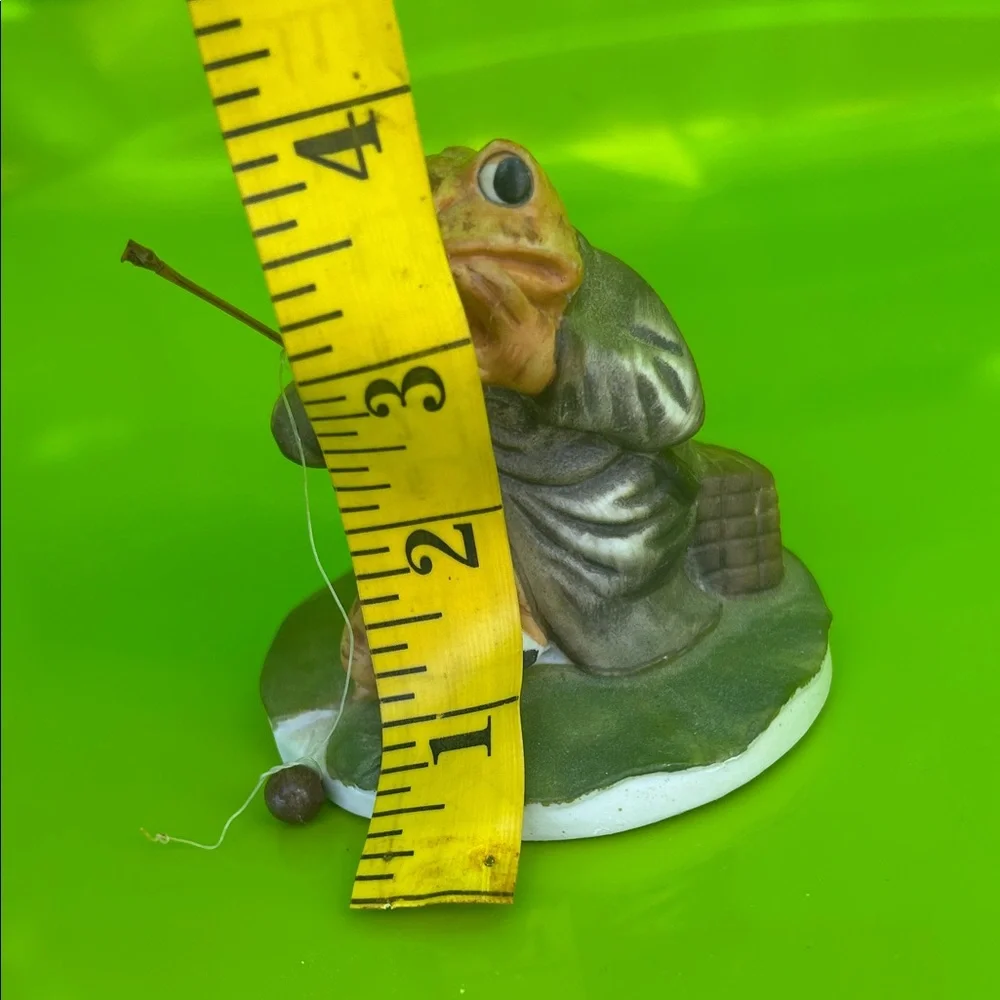 Vintage Reptile Figurine with Fishing Rod